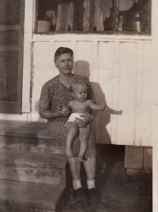 Grandmother hung laundry on her screened-in porch.